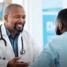 image of a doctor talking to a patient about tobacco cessation options